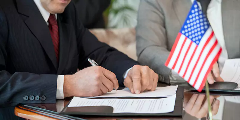 Why Choose Our E2 Visa Legal Services in Nigeria?
